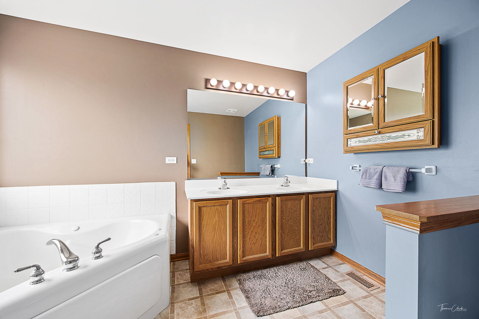 2031 Crosswind Drive Plainfield, IL 60586 - Photo 29 of 35 a spacious bathroom with a tub sink and mirror