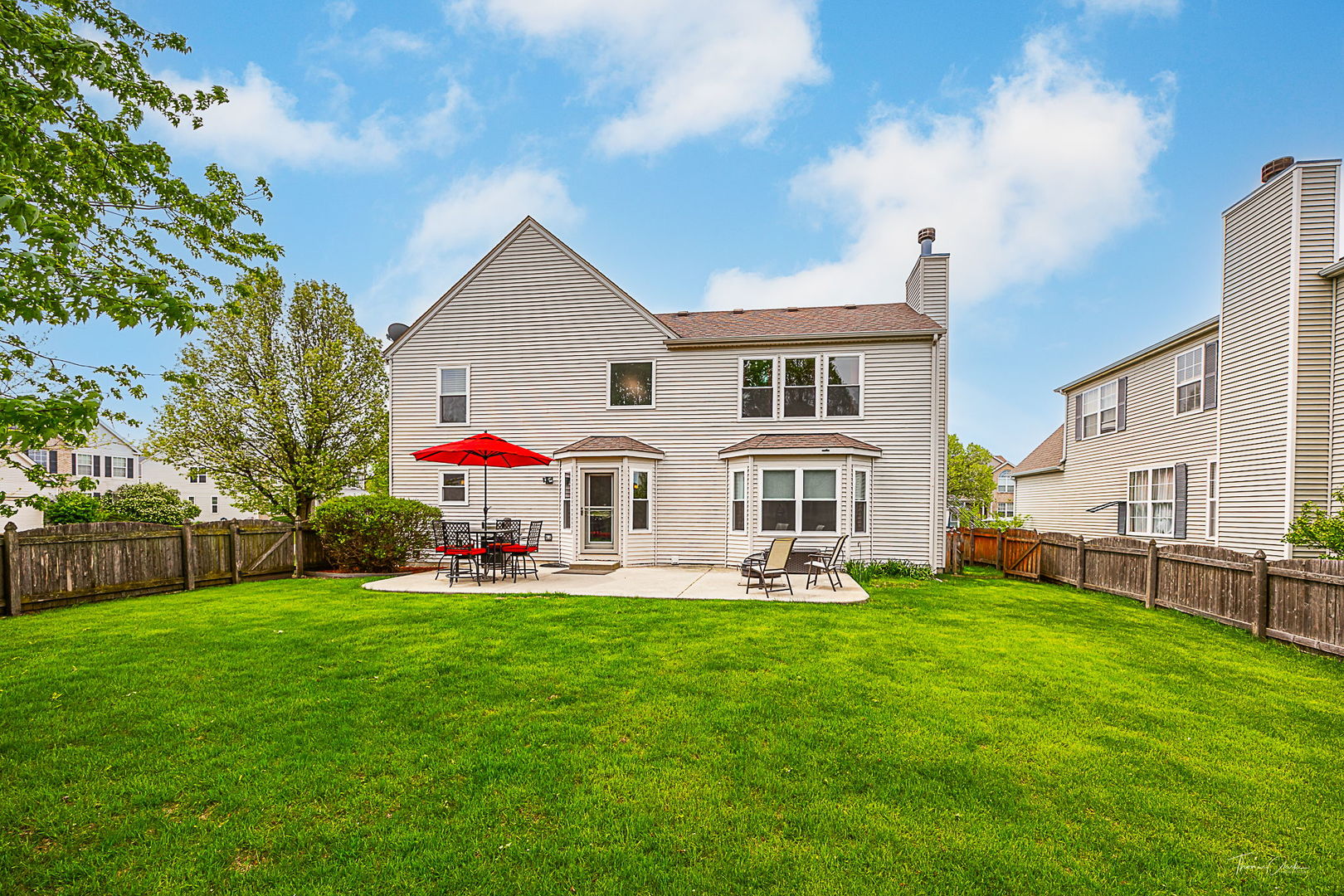 2031 Crosswind Drive Plainfield, IL 60586 - Photo 31 of 35 a front view of house with yard and green space