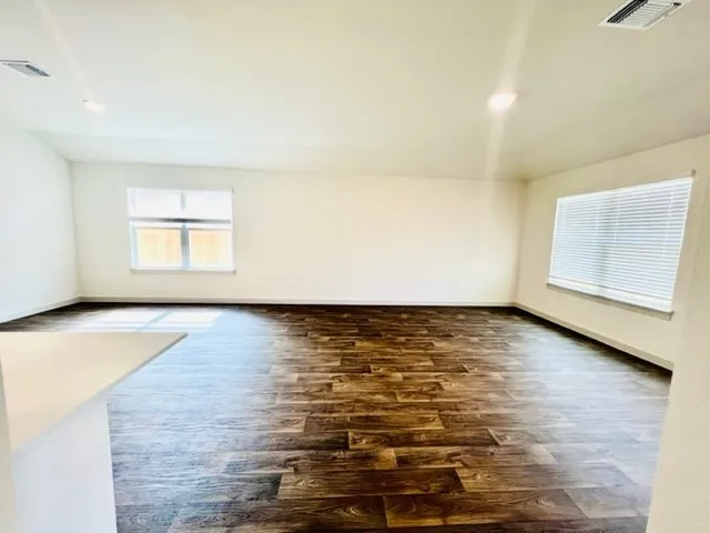 a view of an empty room and window