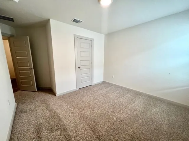 an empty room with closet