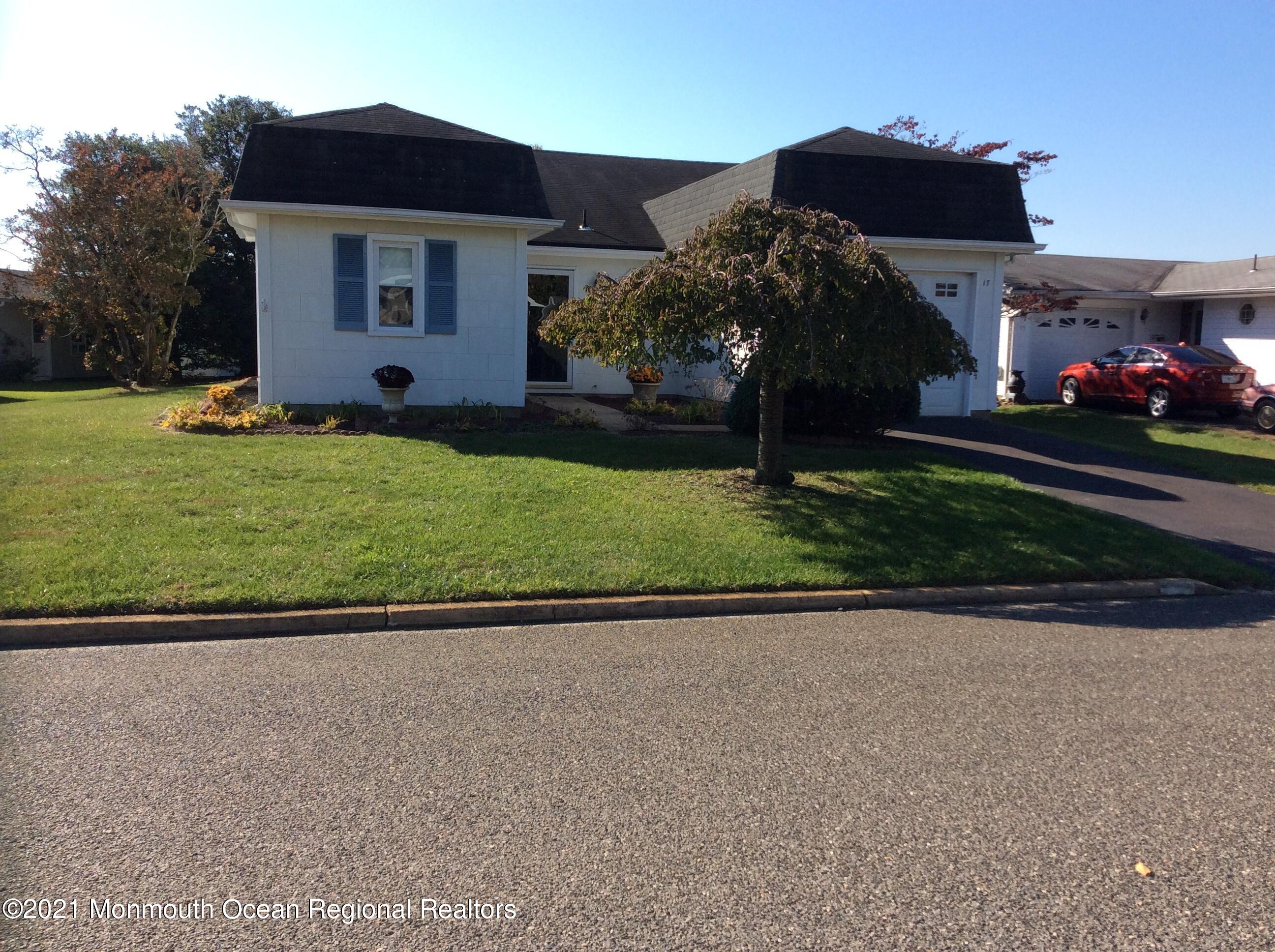 17 Phillips Road Brick, NJ 08724 - Photo 1 of 27 a front view of house with yard and green space
