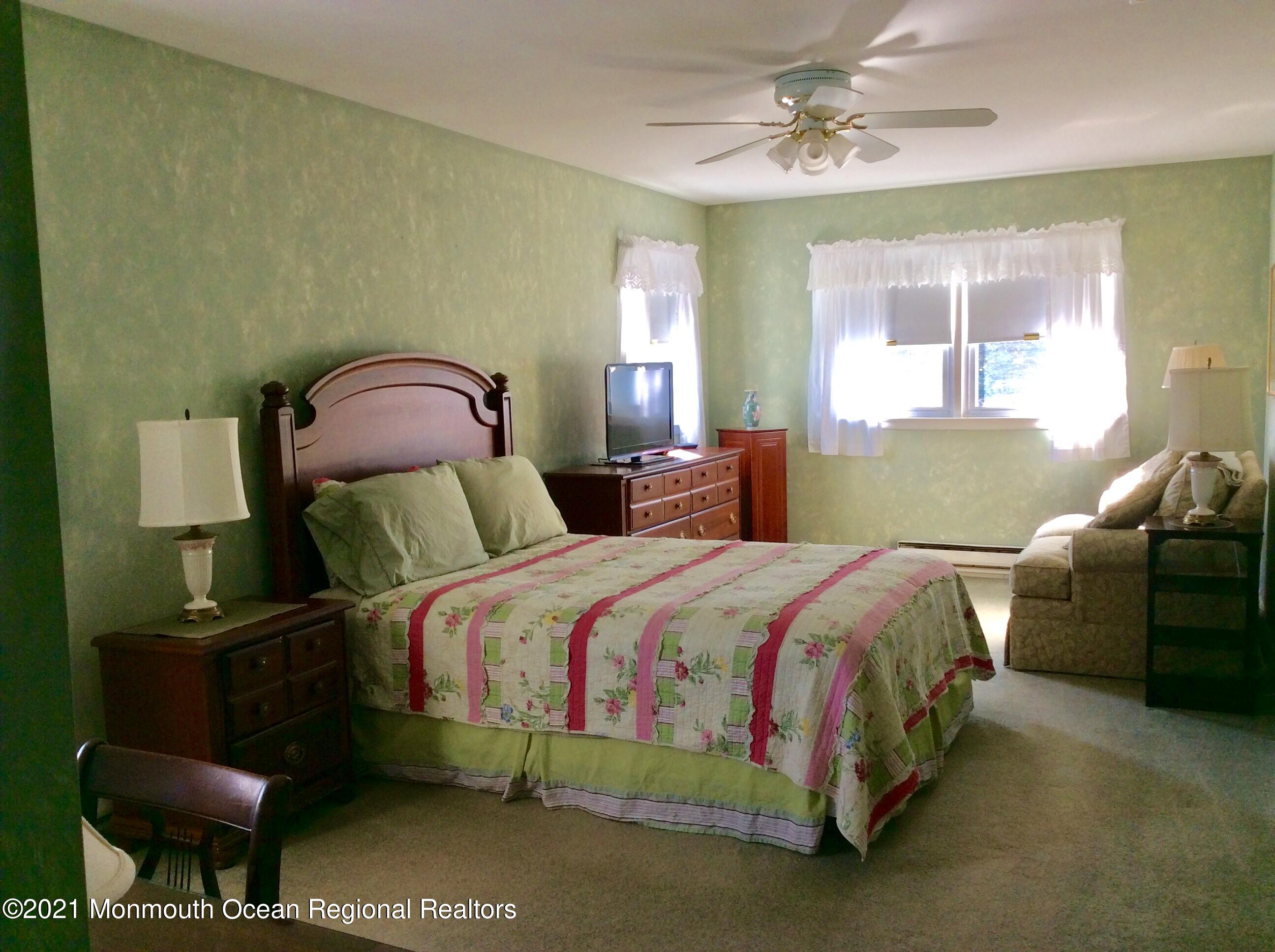 17 Phillips Road Brick, NJ 08724 - Photo 15 of 27 a bedroom with a bed and window