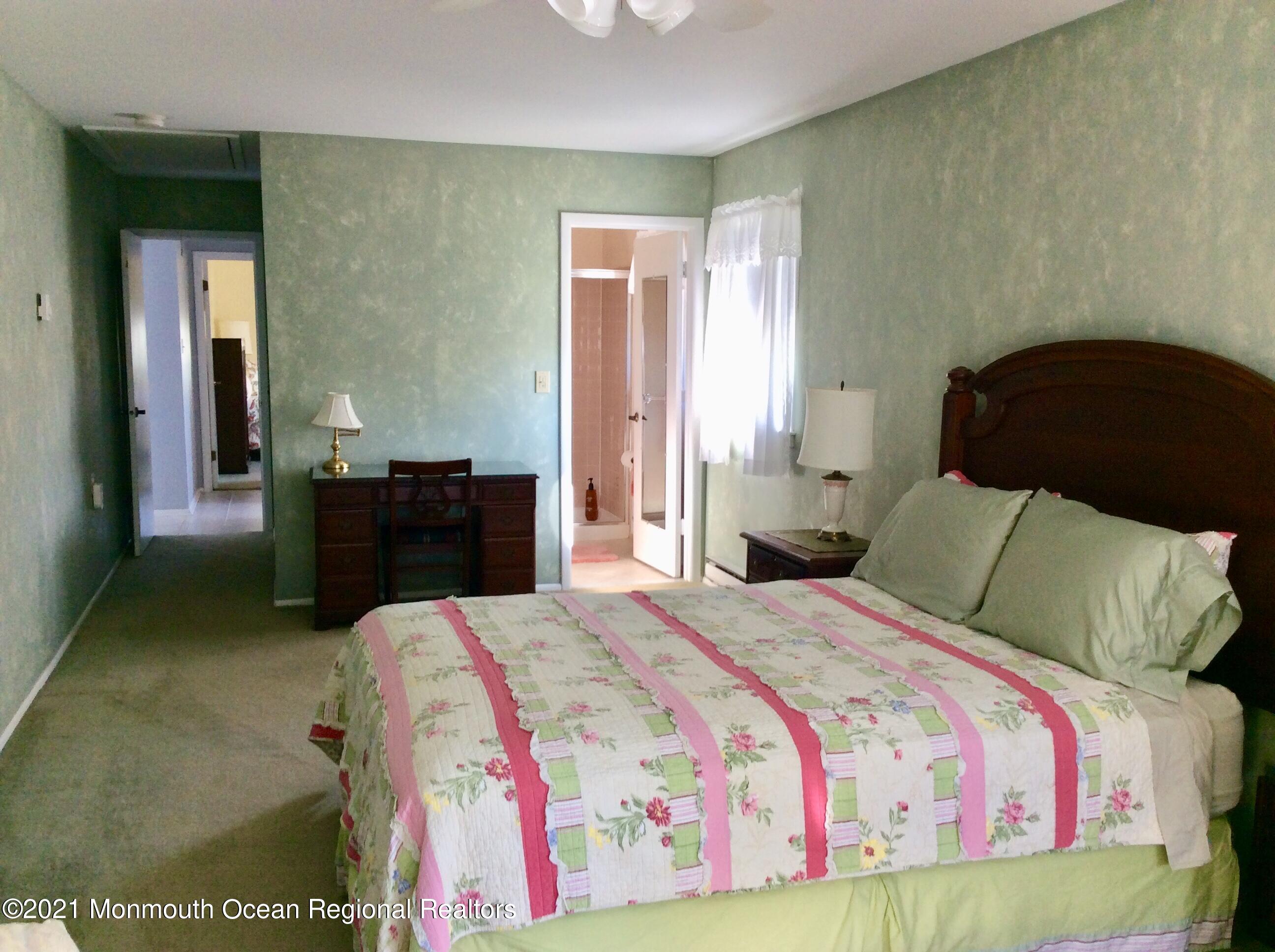 17 Phillips Road Brick, NJ 08724 - Photo 16 of 27 a bedroom with a bed and window