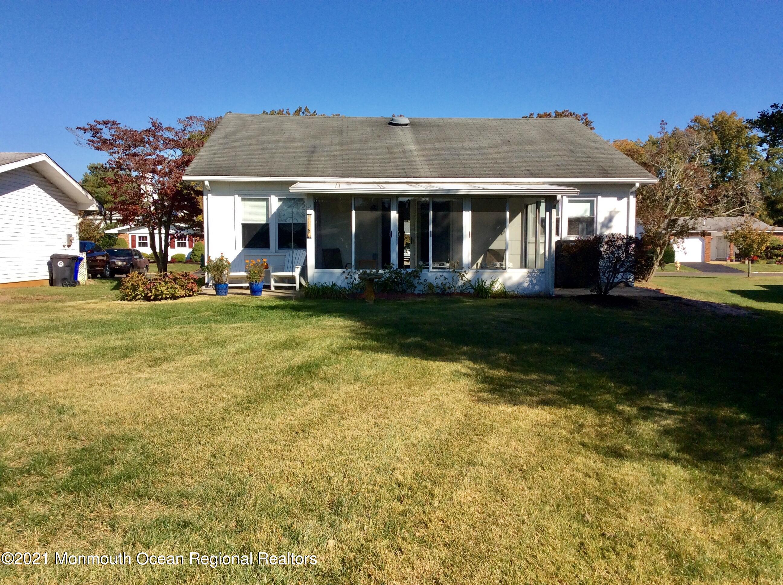 17 Phillips Road Brick, NJ 08724 - Photo 27 of 27 a front view of a house with a garden