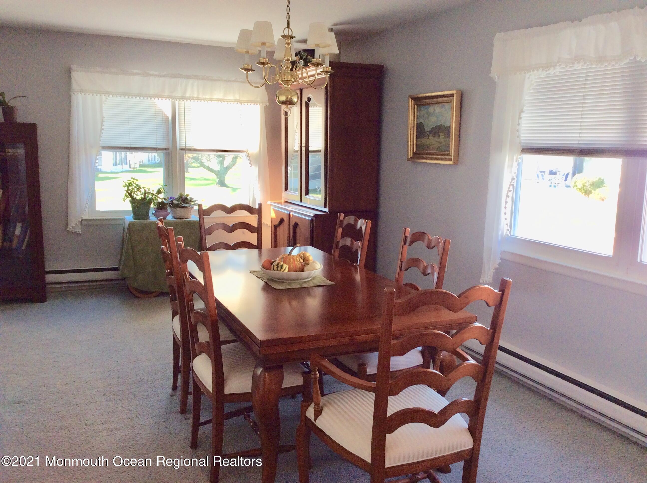 17 Phillips Road Brick, NJ 08724 - Photo 10 of 27 a view of a dining room with furniture window and outside view