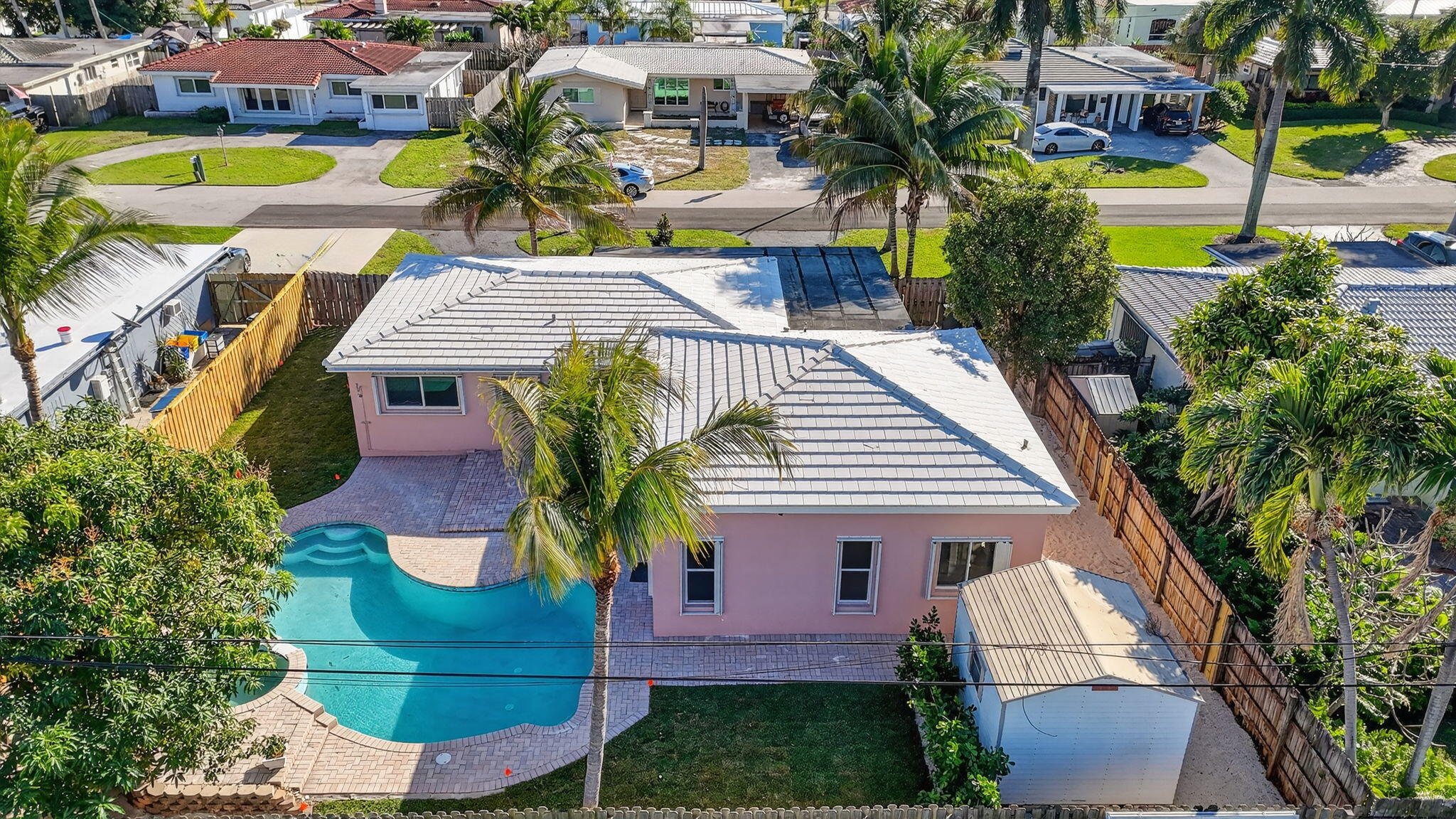 467 Northeast 31st Street Boca Raton, FL 33431 - Photo 12 of 18 a view of a swimming pool with a patio