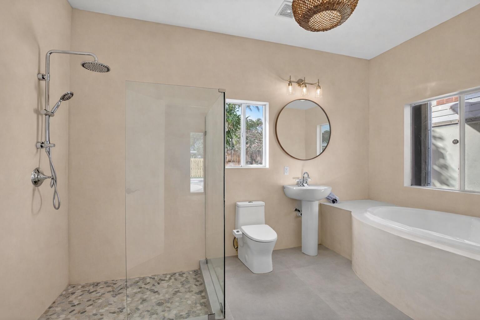 467 Northeast 31st Street Boca Raton, FL 33431 - Photo 4 of 18 a bathroom with a sink a toilet and shower