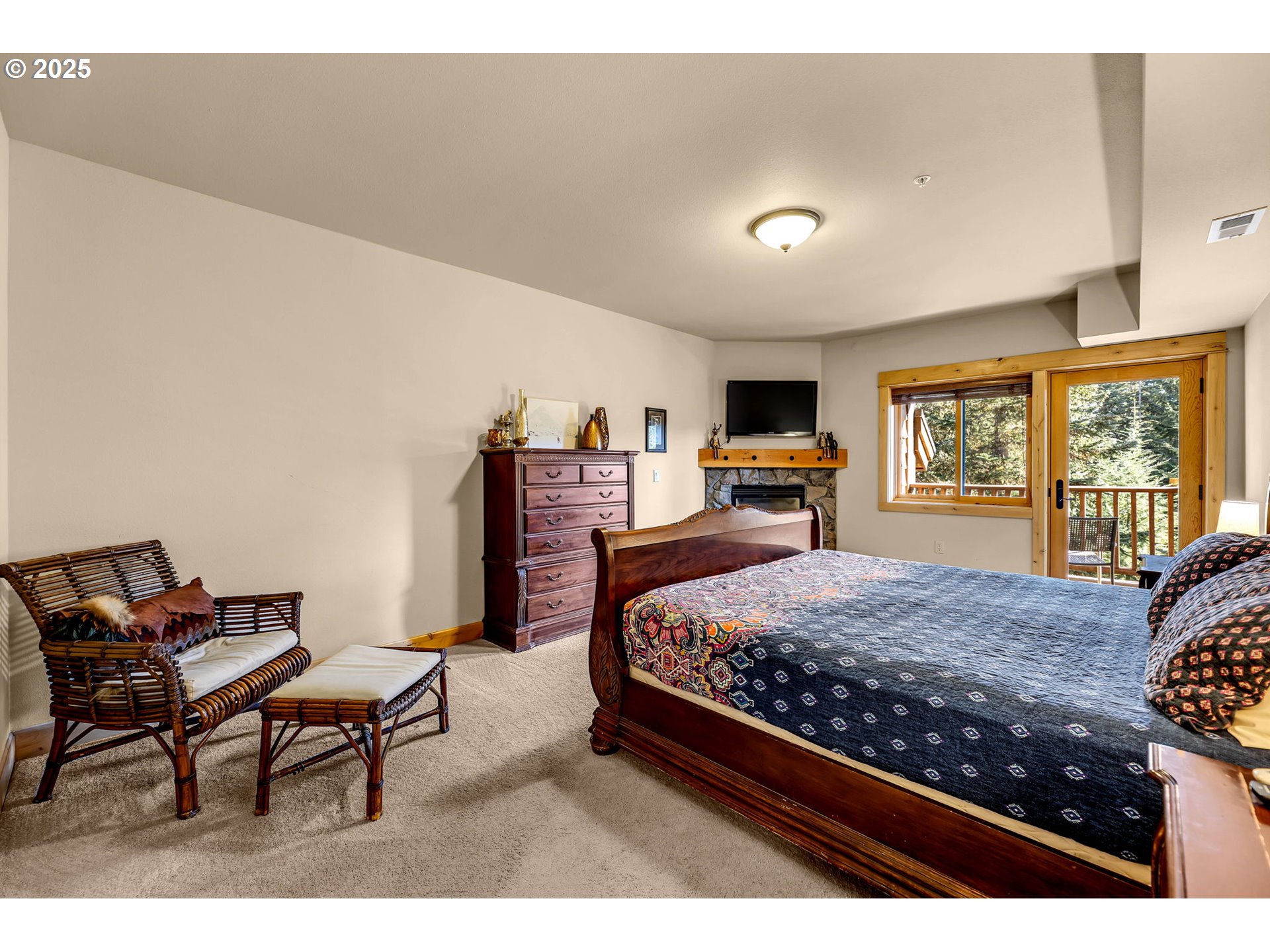 31254 East Collins Lake Road, Unit 22 Government Camp, OR 97028 - Photo 24 of 44 a bed room with a bed window and chair