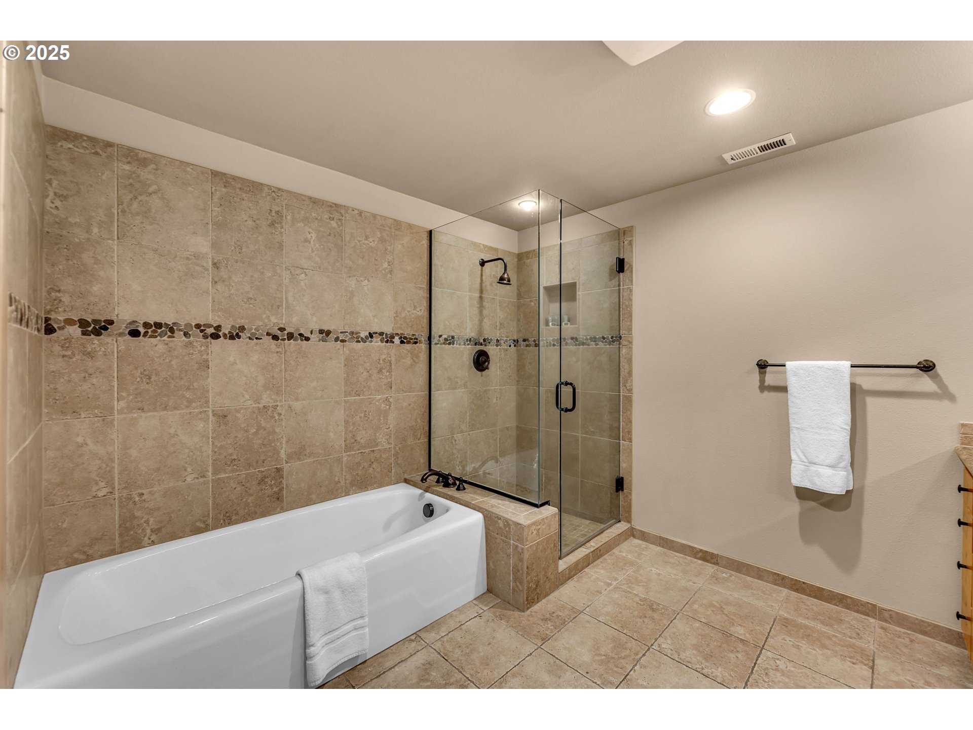 31254 East Collins Lake Road, Unit 22 Government Camp, OR 97028 - Photo 27 of 44 a bathroom with a tub a shower and a sink