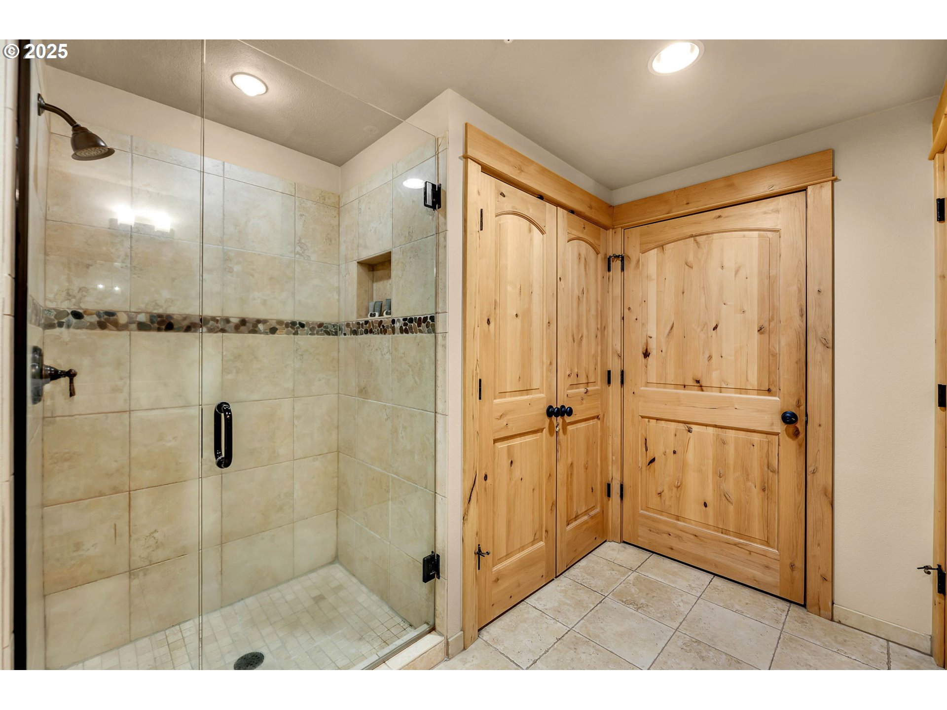 31254 East Collins Lake Road, Unit 22 Government Camp, OR 97028 - Photo 31 of 44 a bathroom with a glass shower door