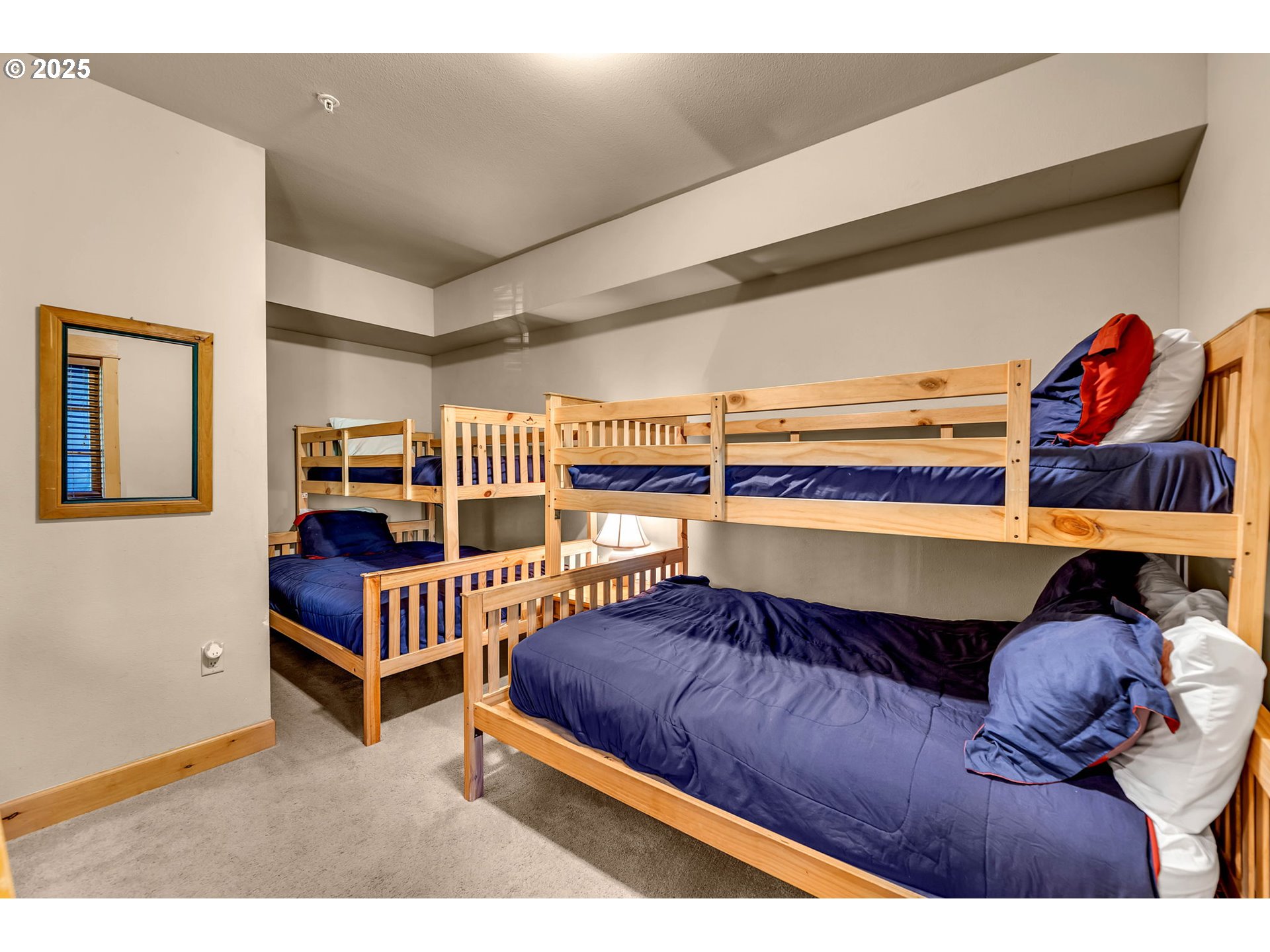 31254 East Collins Lake Road, Unit 22 Government Camp, OR 97028 - Photo 32 of 44 a living room with furniture and a book shelf