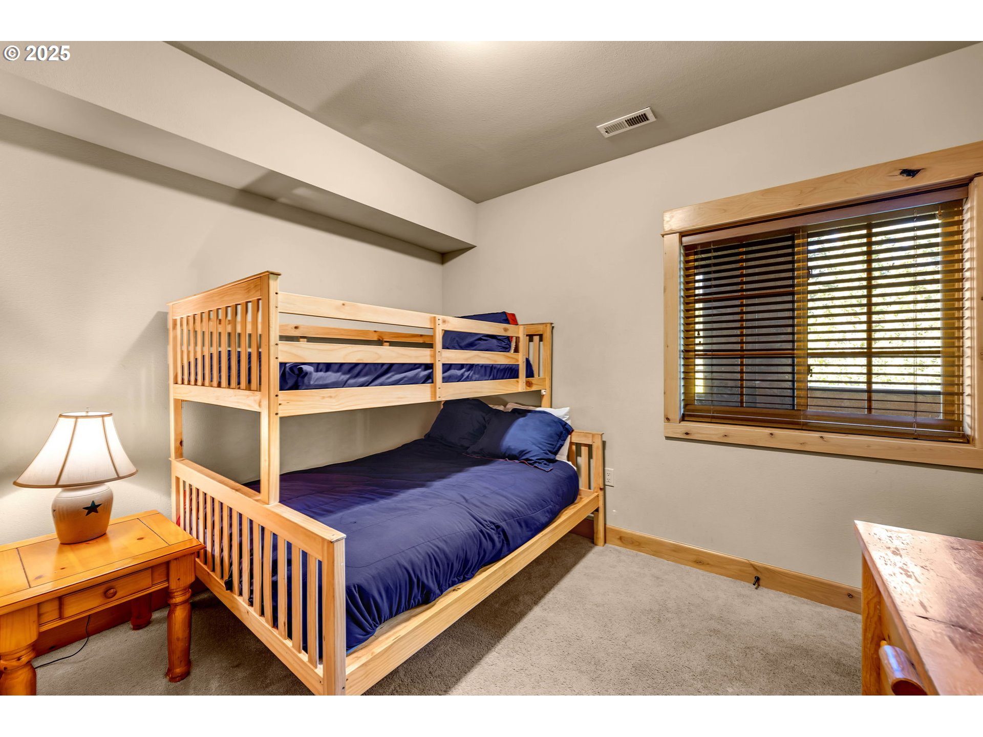 31254 East Collins Lake Road, Unit 22 Government Camp, OR 97028 - Photo 33 of 44 a bedroom with furniture and a window