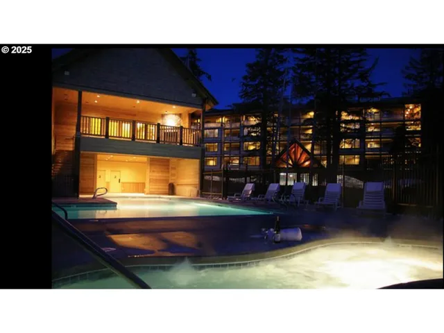 a black and white photo of a living room