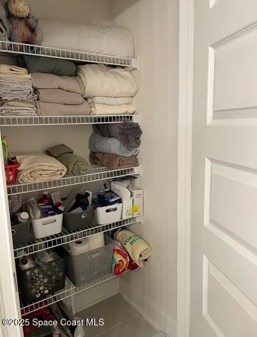 a close view of shoes stand and cabinets