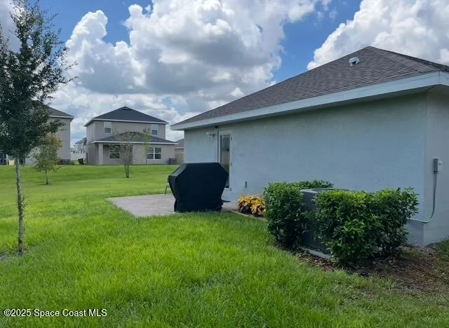 a house view with a garden space