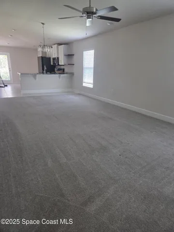 a view of a kitchen with a sink