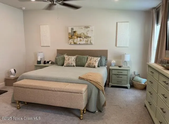 a bedroom with a bed and a cabinets