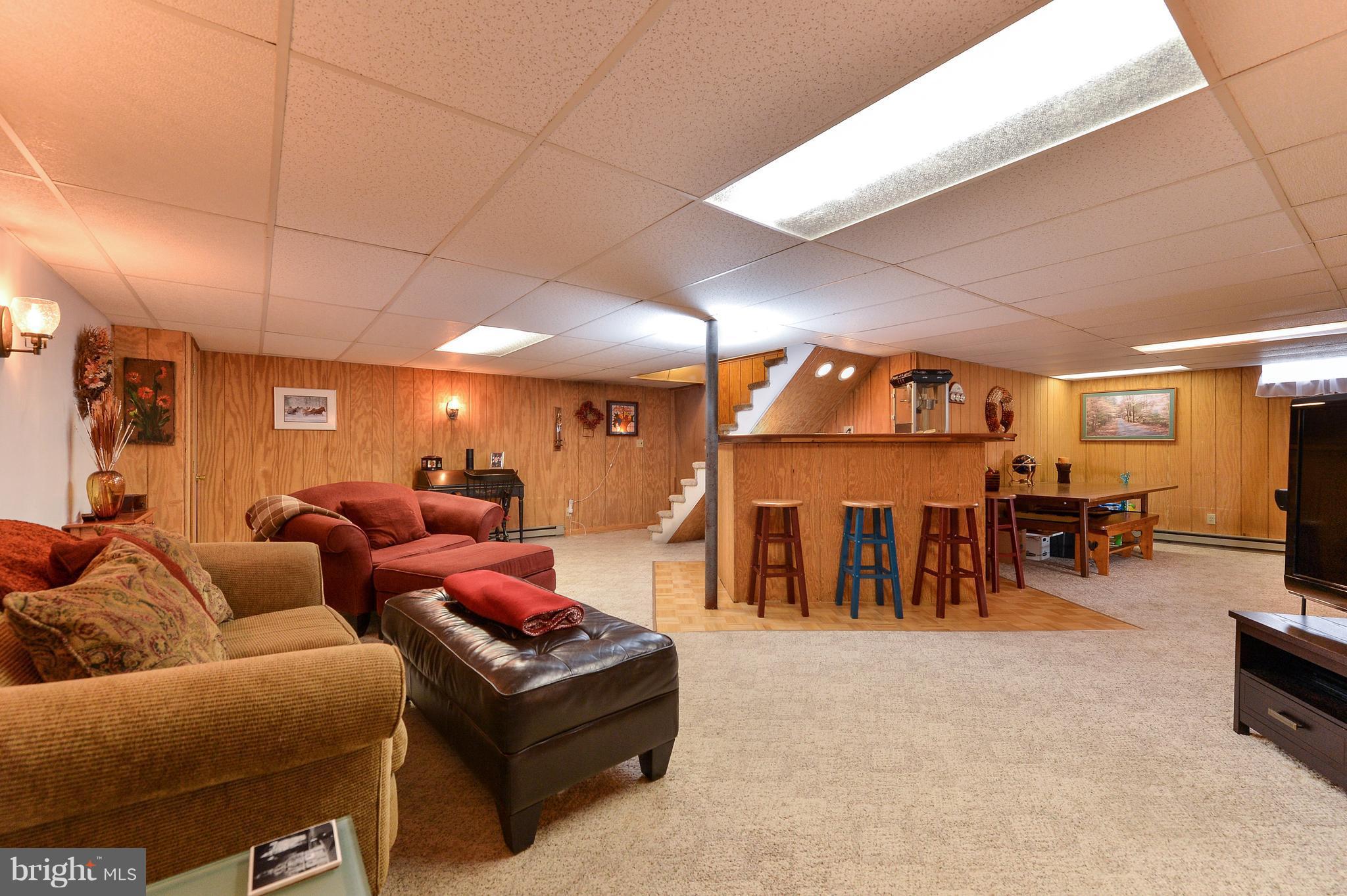 1307 Oldfield Point Road Elkton, MD 21921 - Photo 19 of 27 BASEMENT WITH BAR
