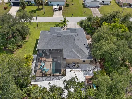 an aerial view of a house with a garden