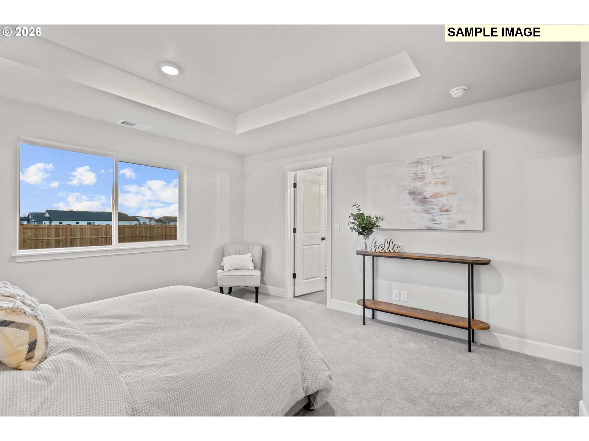 481 Taft Street Umatilla, OR 97882 - Photo 14 of 18 a bedroom with a bed and a painting on the wall