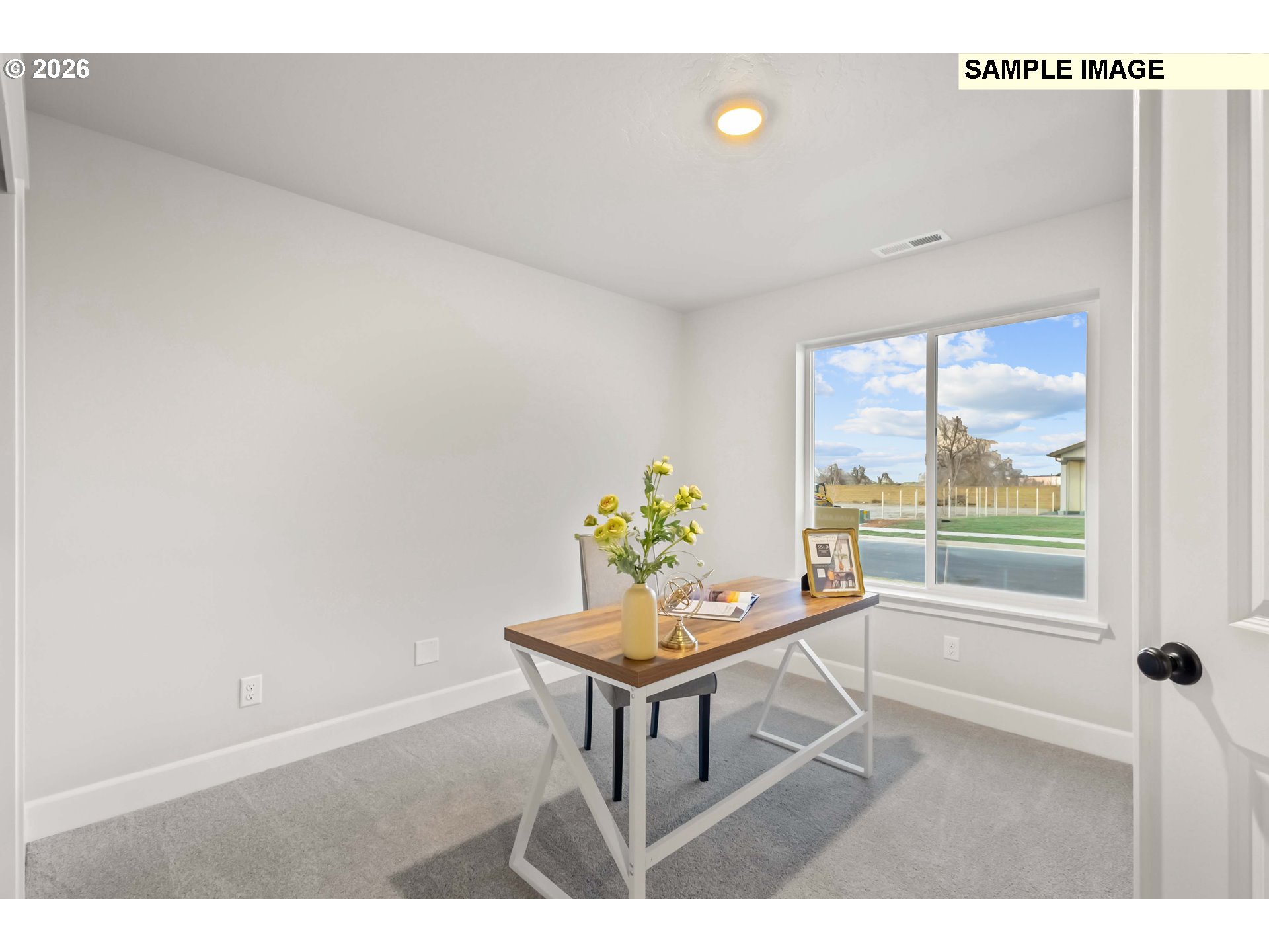 481 Taft Street Umatilla, OR 97882 - Photo 3 of 18 a living room with furniture and a window