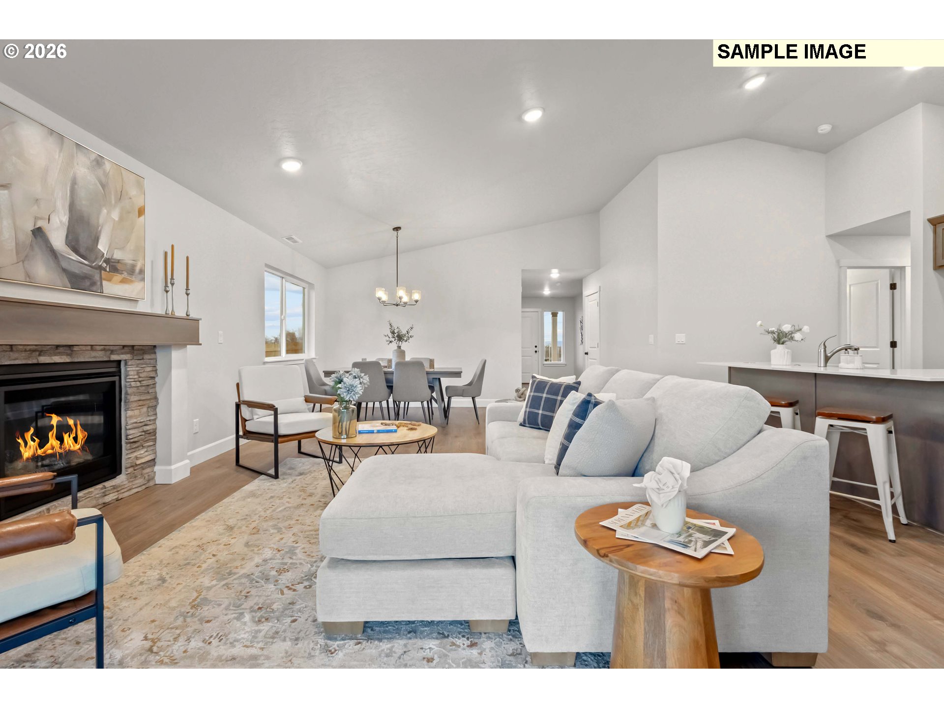 481 Taft Street Umatilla, OR 97882 - Photo 9 of 18 a living room with furniture and a fireplace