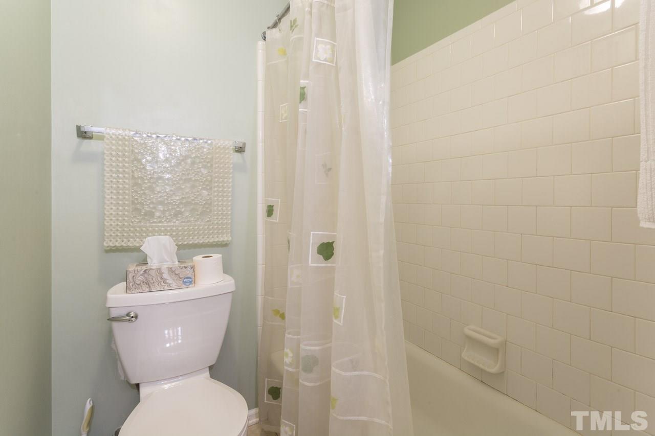 6705 Twin Tree Court Raleigh, NC 27613 - Photo 15 of 20 Second floor bedroom private bathroom.