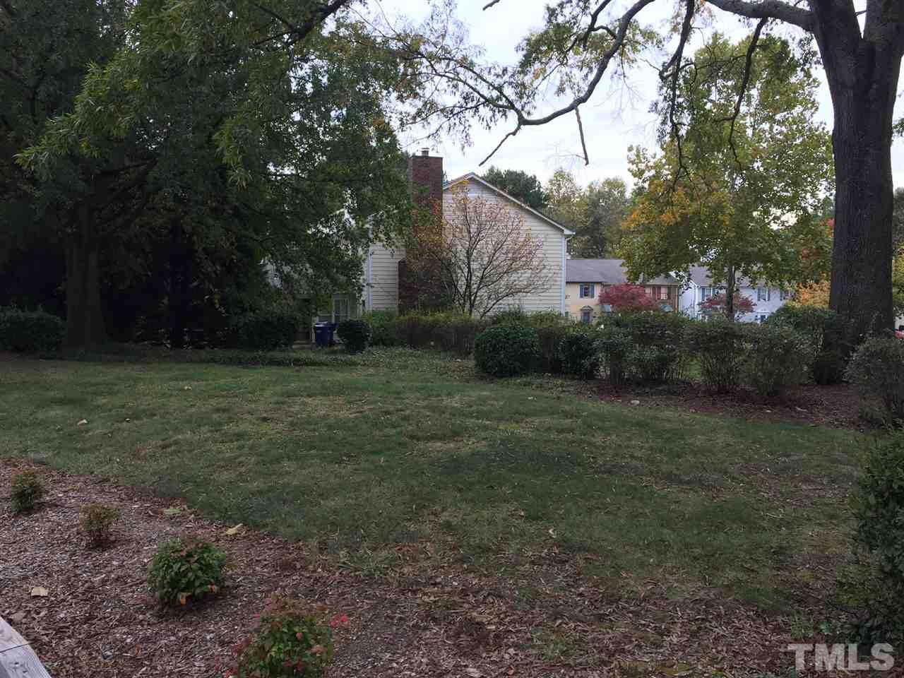 6705 Twin Tree Court Raleigh, NC 27613 - Photo 19 of 20 Open common area in back - like having a park in your backyard!