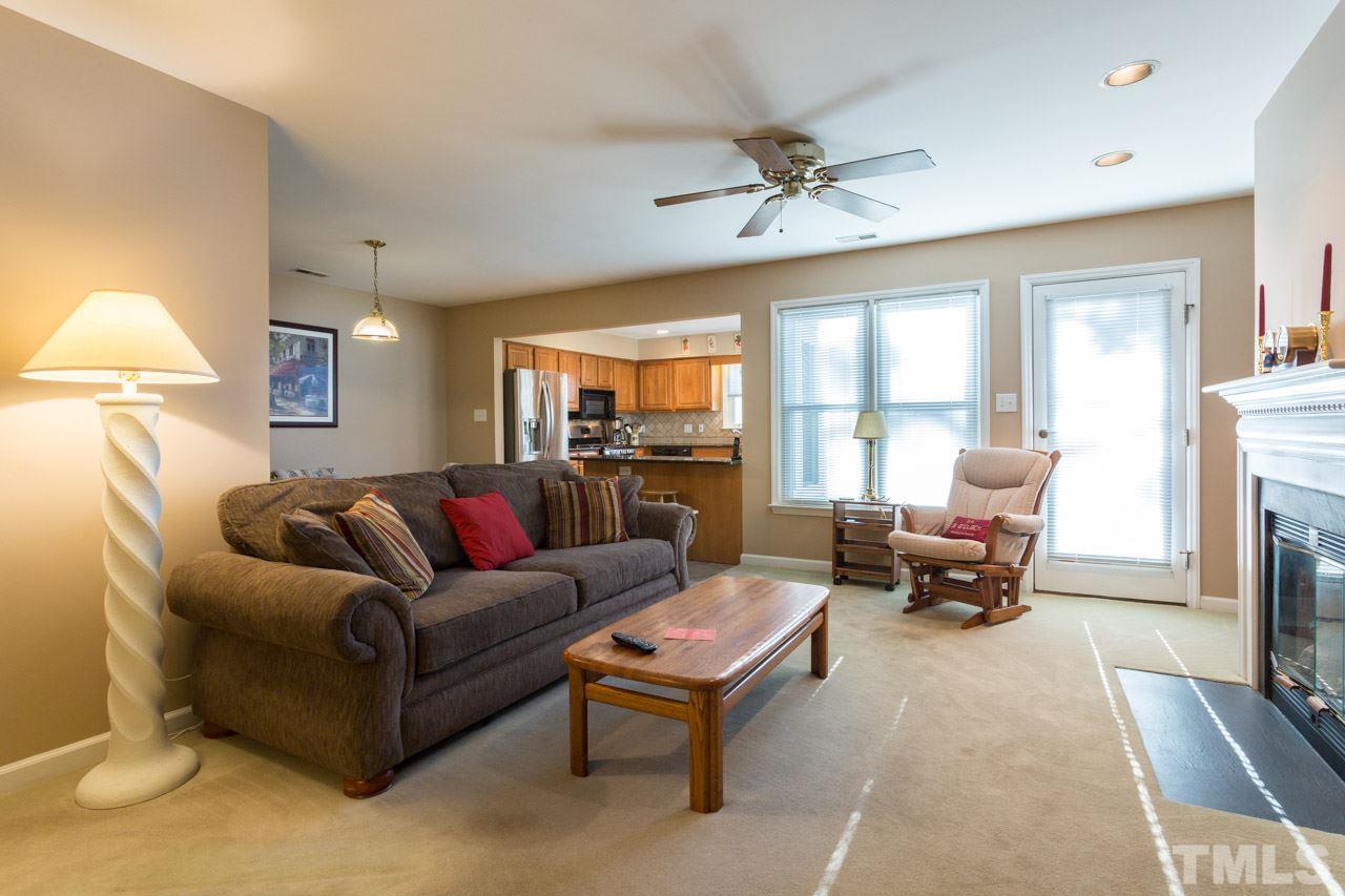 6705 Twin Tree Court Raleigh, NC 27613 - Photo 3 of 20 Large family room with gas fireplace, recessed lighting, ceiling fan and lots of windows!