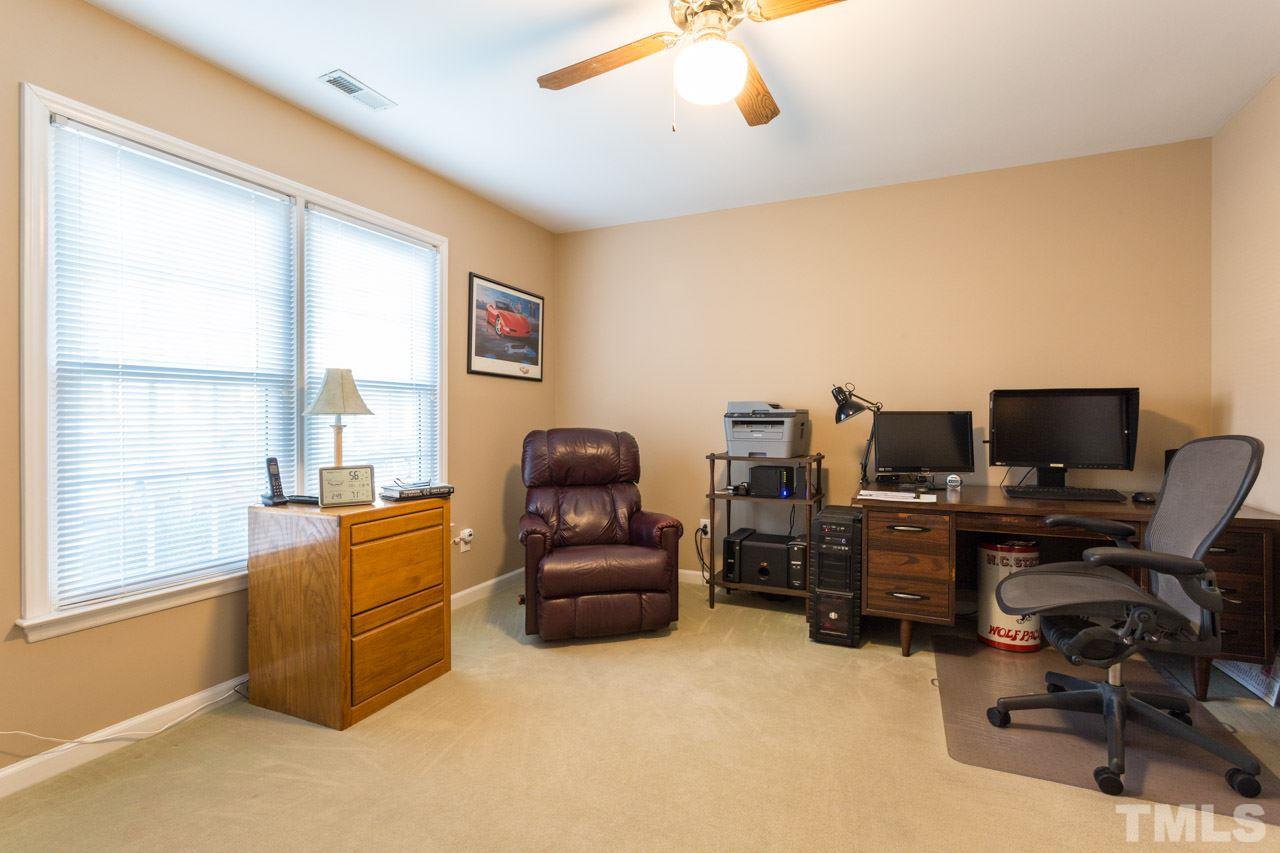 6705 Twin Tree Court Raleigh, NC 27613 - Photo 9 of 20 Large first floor bedroom or office with attached full bath.