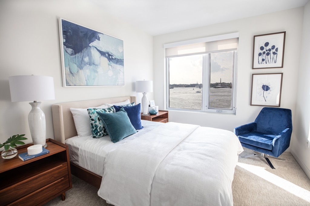 45 Lewis Street, Unit 116 Boston, MA 02128 - Photo 22 of 26 a bedroom with a bed and window