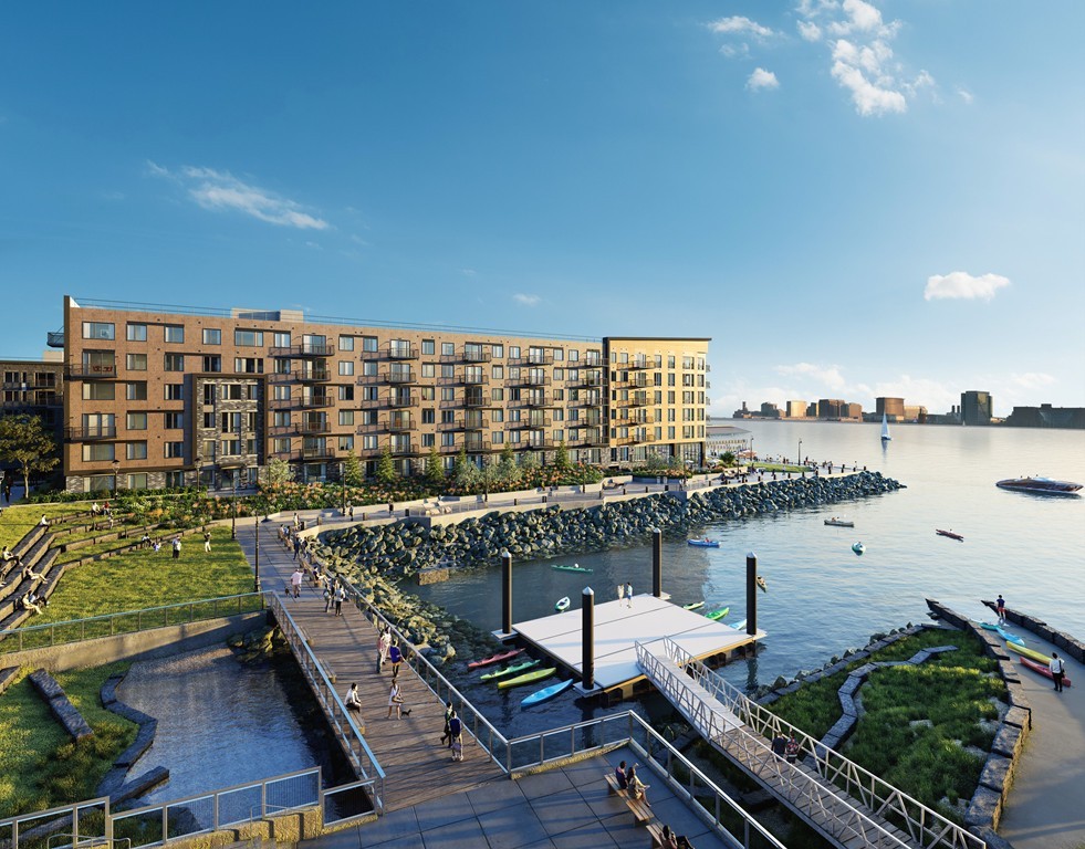 45 Lewis Street, Unit 116 Boston, MA 02128 - Photo 4 of 26 a roof deck with couches and wooden floor