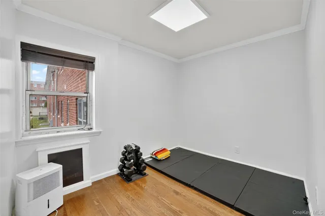 a bed room with a bed and a window