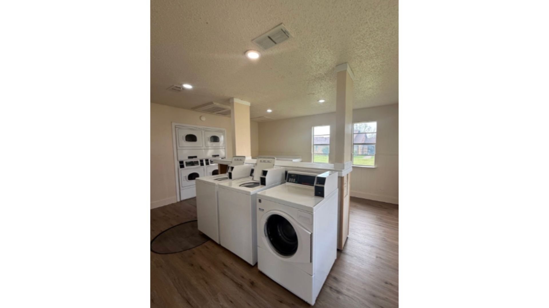 1510 East Loop 304 Crockett, TX 75835 - Photo 15 of 17 a view of a kitchen with washer and dryer