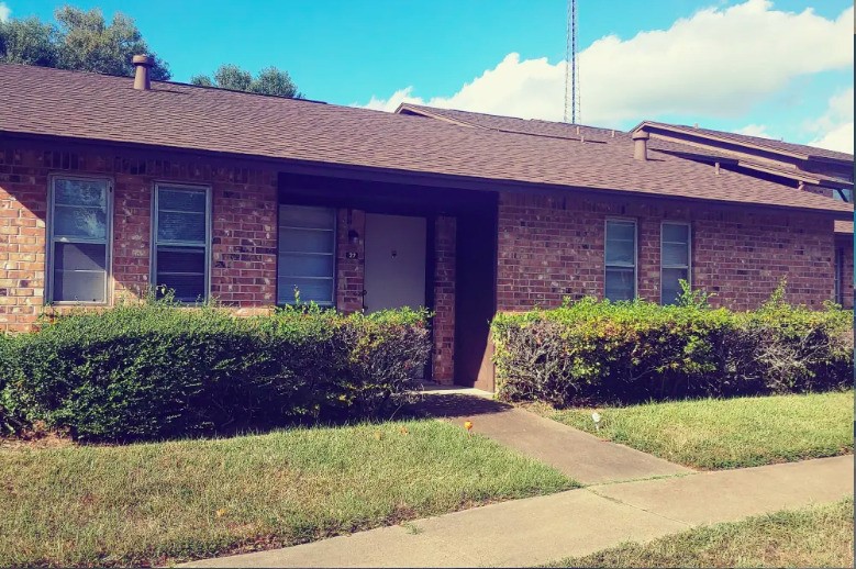 1510 East Loop 304 Crockett, TX 75835 - Photo 2 of 17 a view of a house with a garden