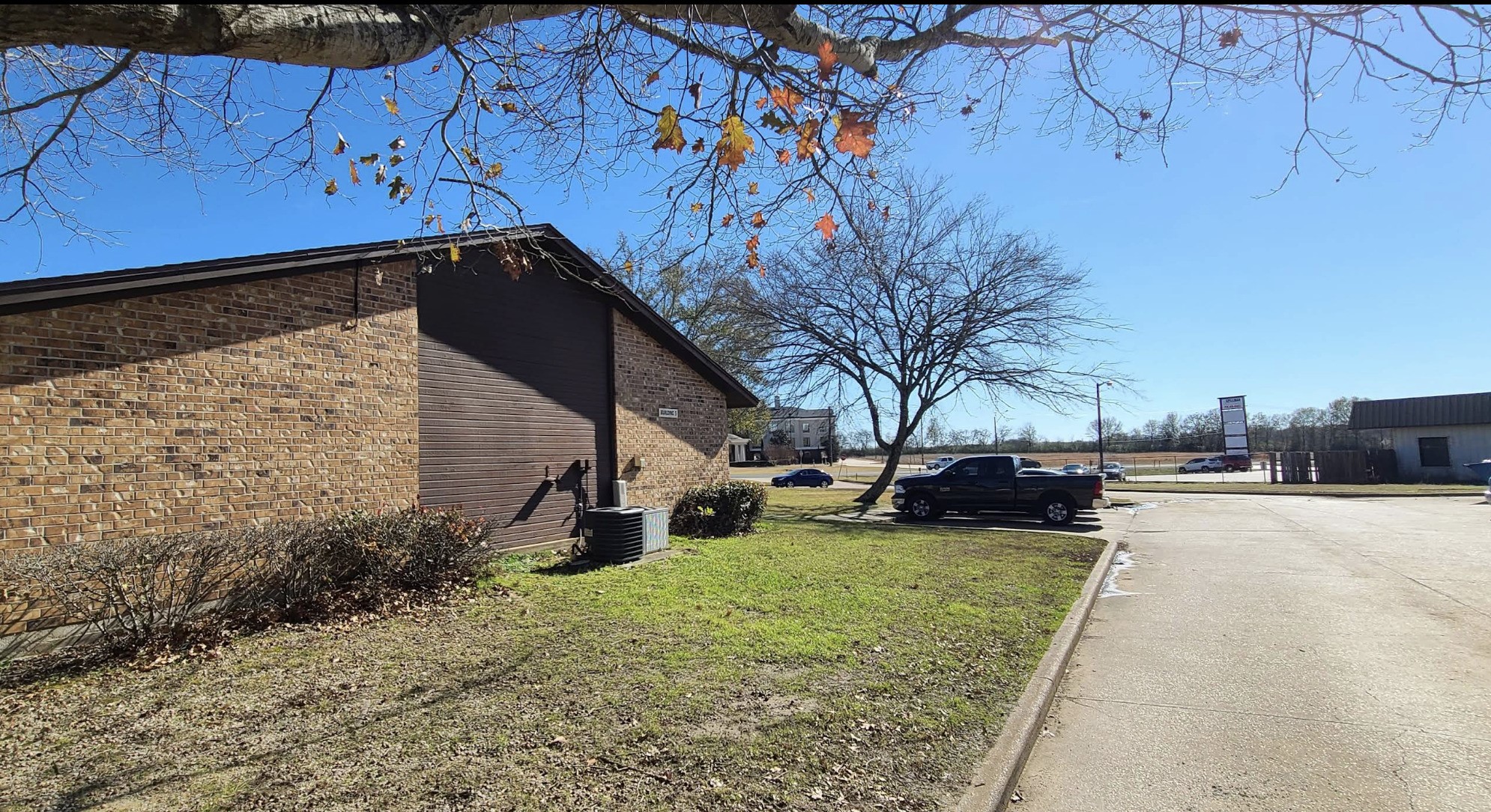 1510 East Loop 304 Crockett, TX 75835 - Photo 7 of 17 a view of a yard with wooden fence
