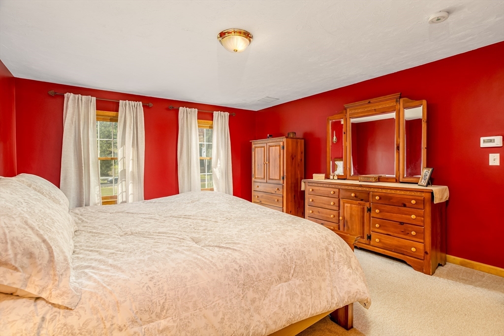16 Hillside Drive Townsend, MA 01469 - Photo 18 of 35 a bedroom with a bed and a dresser