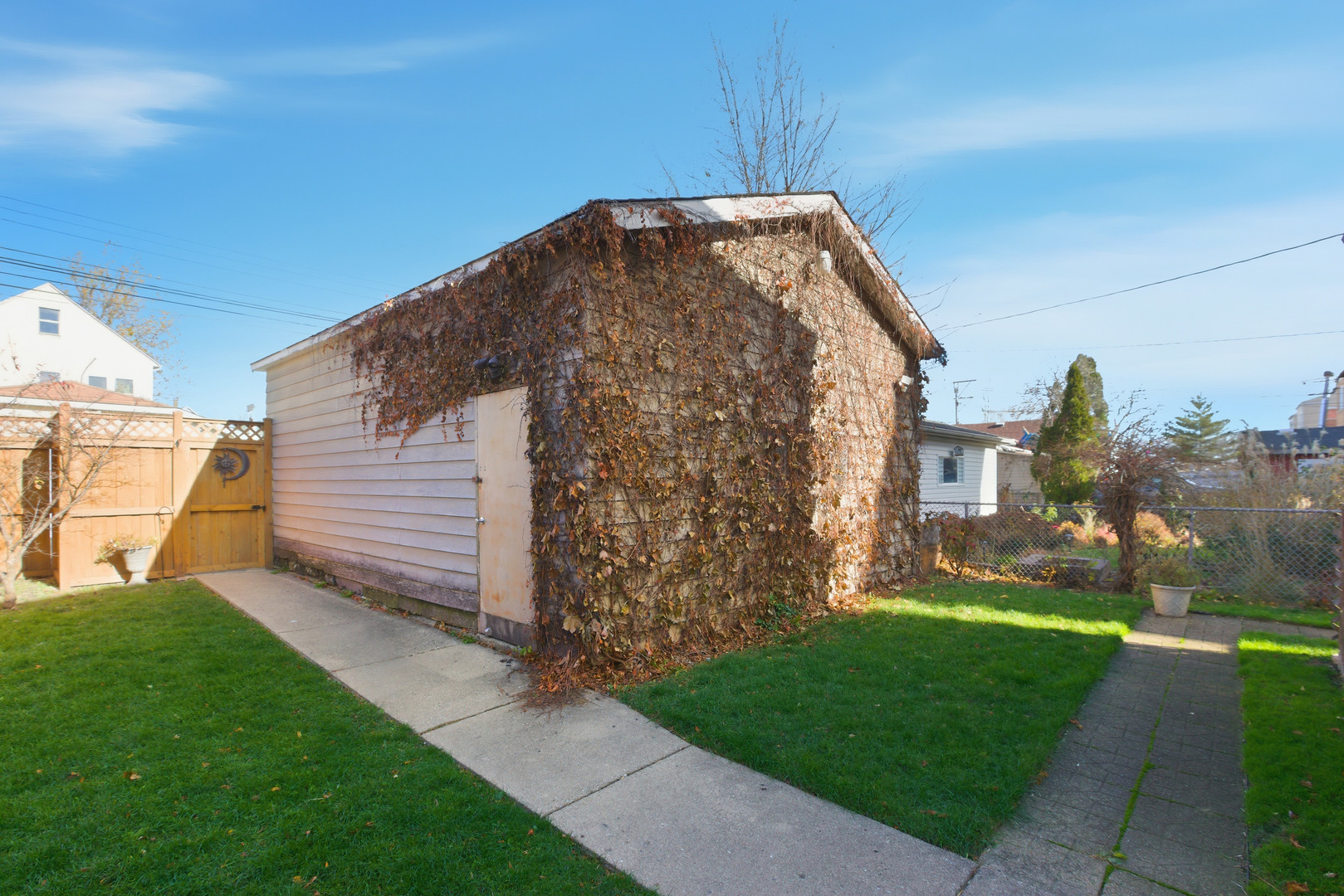 5434 West Wrightwood Avenue Chicago, IL 60639 - Photo 21 of 21 a view of a house with a yard