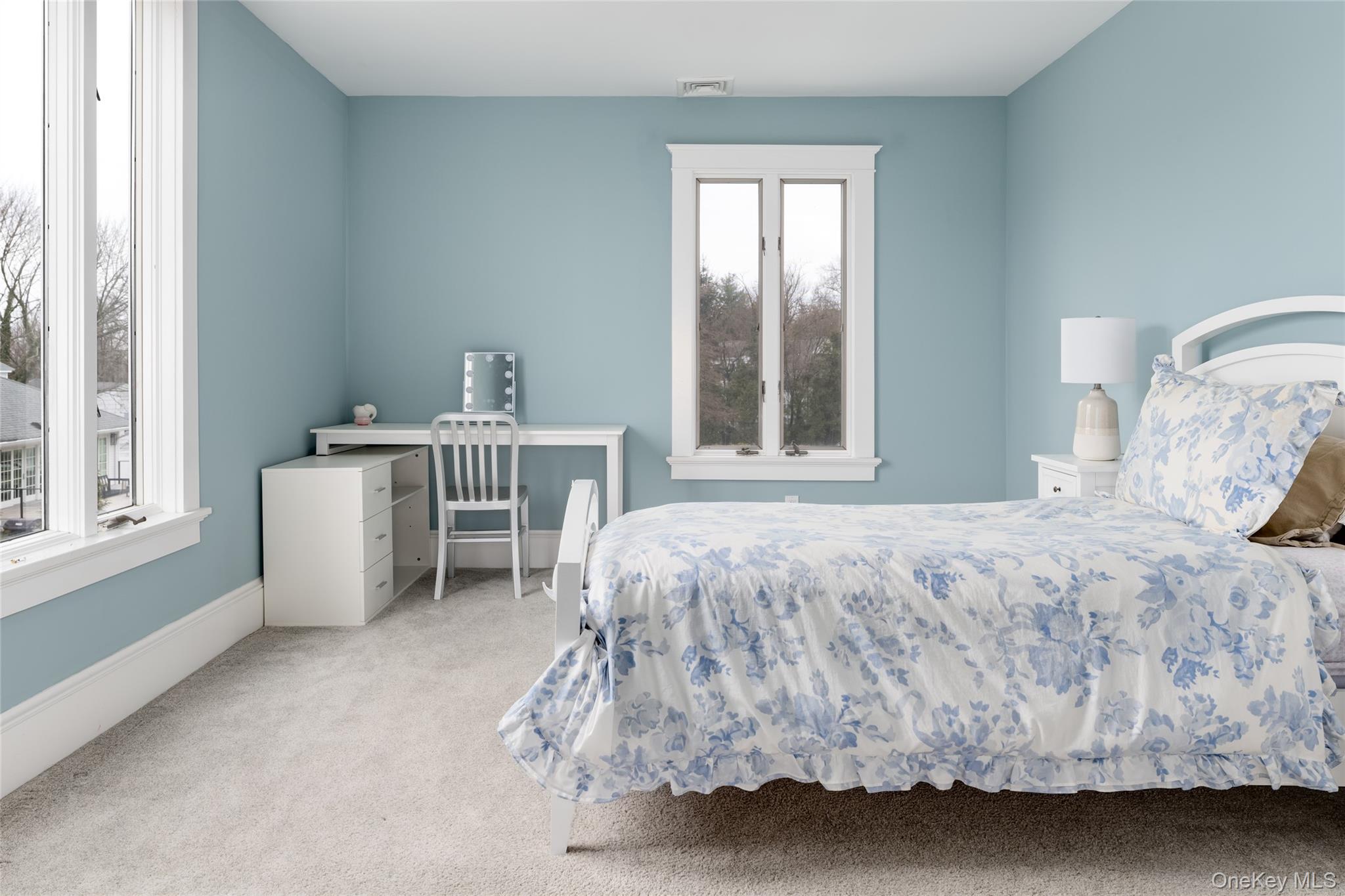 239 Sunny Ridge Road Harrison, NY 10528 - Photo 20 of 33 a bedroom with a bed and a window