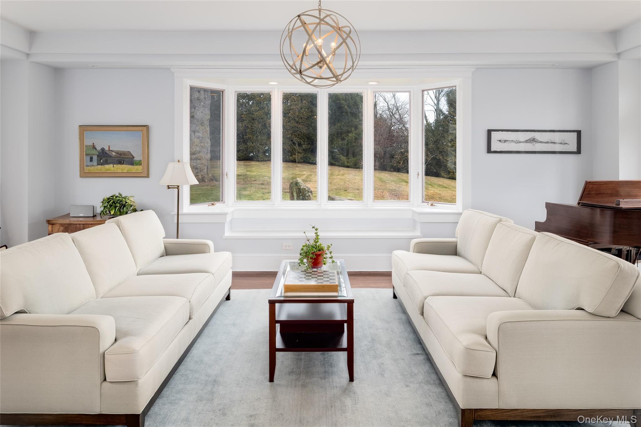 239 Sunny Ridge Road Harrison, NY 10528 - Photo 4 of 33 a living room with furniture and a large window