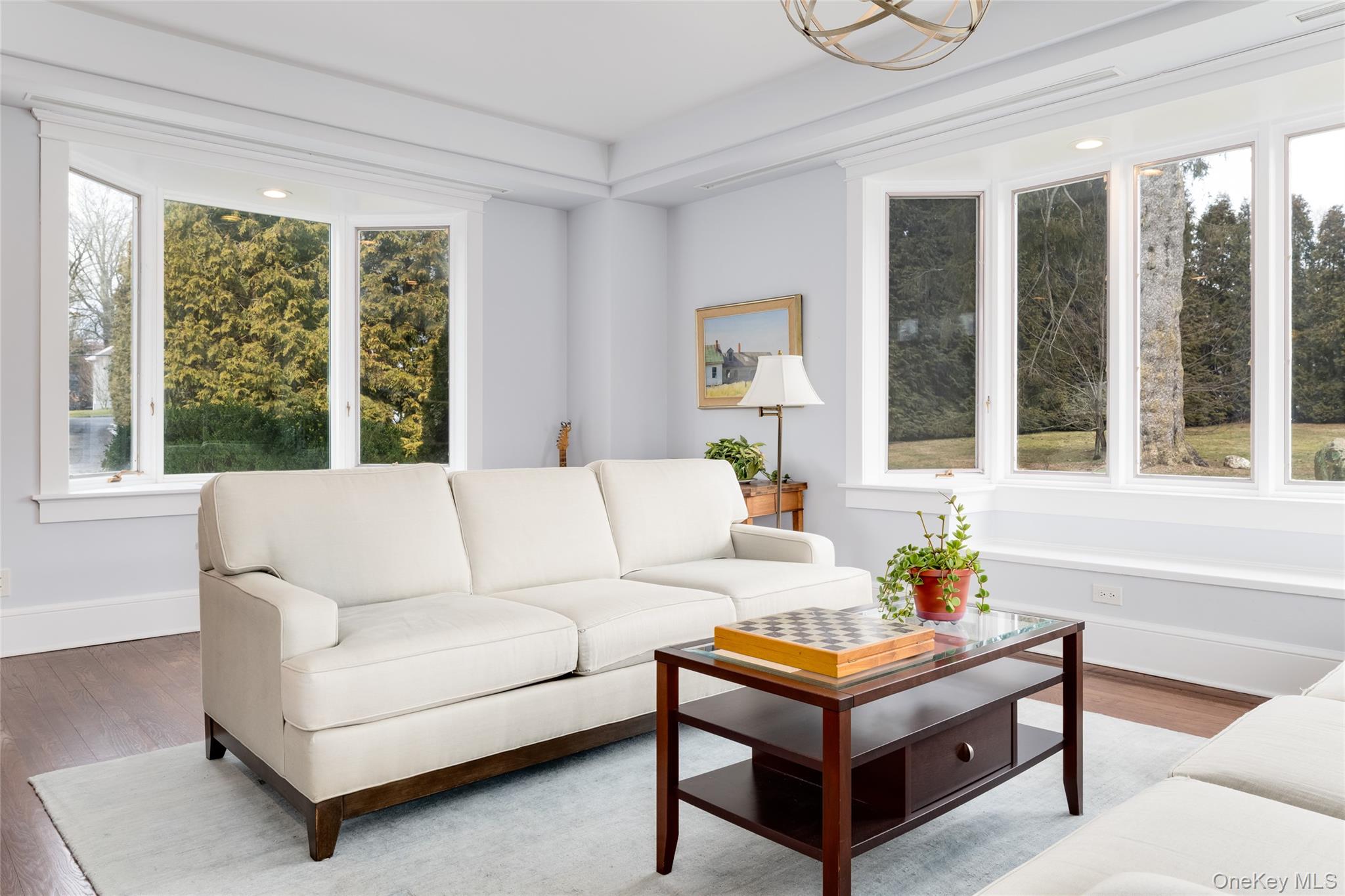 239 Sunny Ridge Road Harrison, NY 10528 - Photo 6 of 33 a living room with furniture and a large window