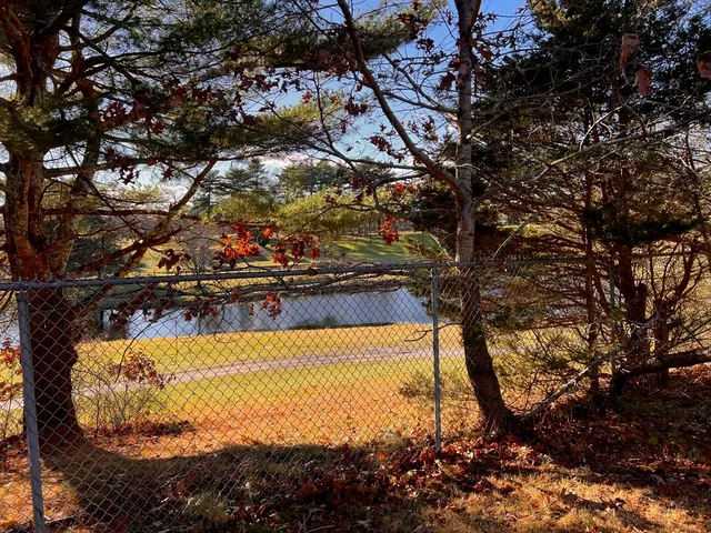 a view of swimming pool from a lake