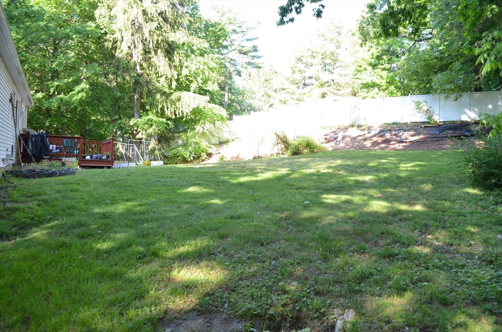 157 Southville Road Southborough, MA 01772 - Photo 13 of 13 a backyard of a house with table and chairs
