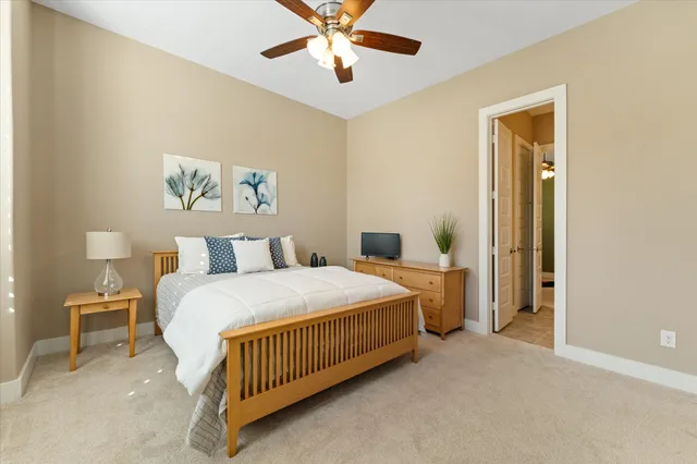 a en suite bathroom with double sink and a mirror