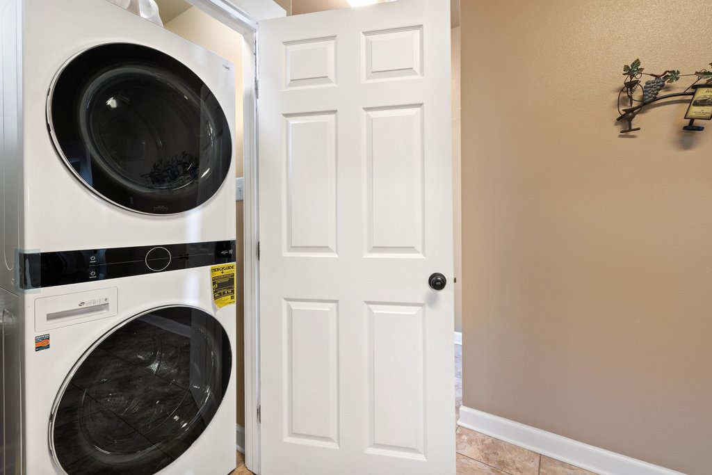 312 West 3rd Street Taylor, TX 76574 - Photo 14 of 33 a view of a hallway with washer and dryer
