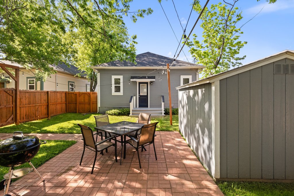312 West 3rd Street Taylor, TX 76574 - Photo 29 of 33 a view of a house with backyard and sitting area
