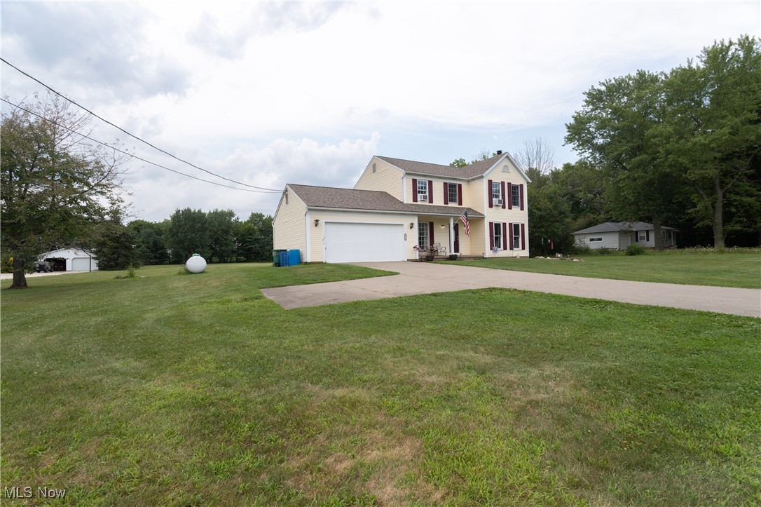 4171 Laubert Road Atwater, OH 44201 - Photo 40 of 42 Colonial home featuring a front lawn