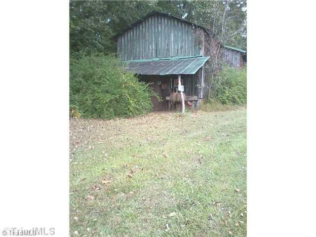 0 Iron Works Road Reidsville, NC 27320 - Photo 9 of 10 Stable/Barn. Tobacco Barn at front of property.
