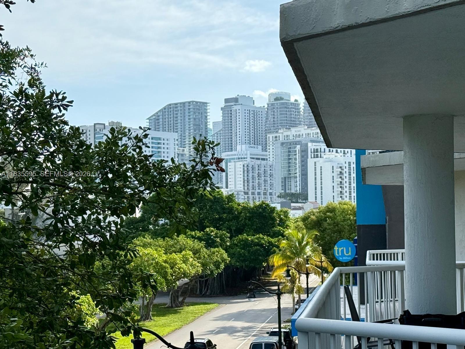 280 Southwest 20th Road, Unit 404 Miami, FL 33129 - Photo 19 of 19 a view of swimming pool from a balcony