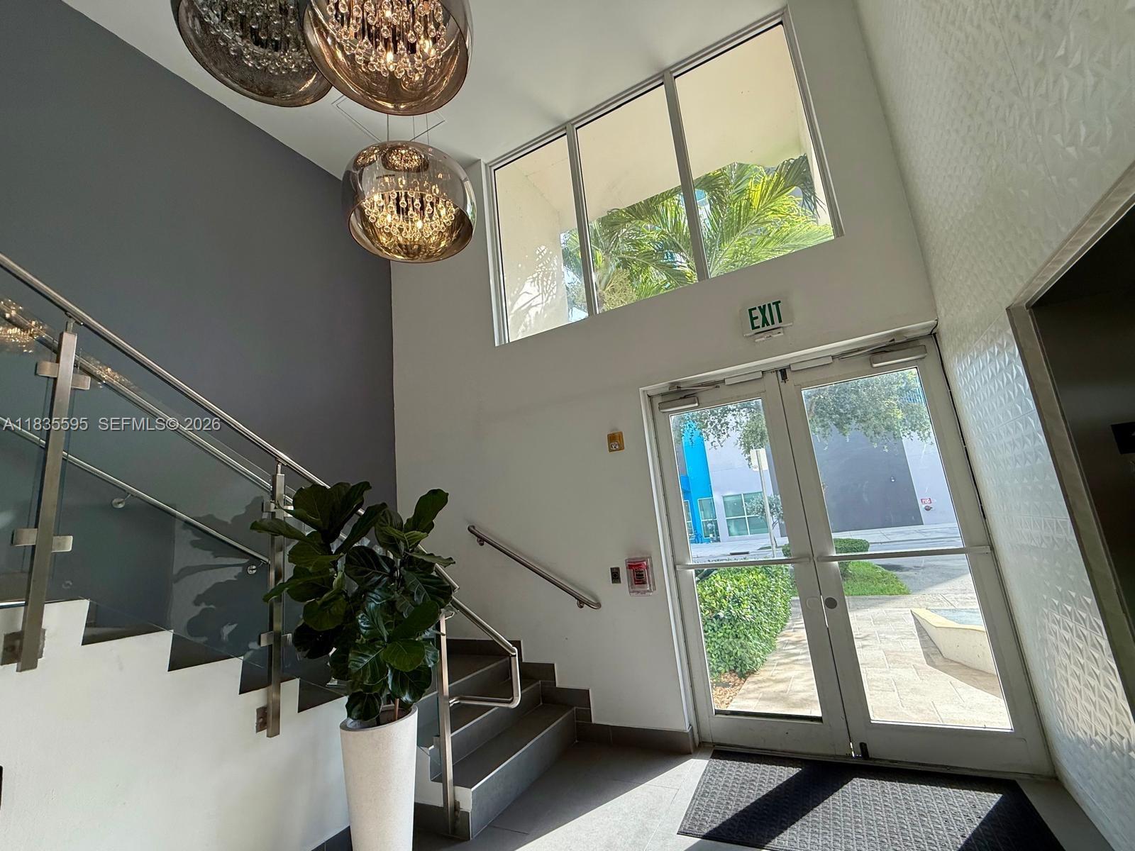 280 Southwest 20th Road, Unit 404 Miami, FL 33129 - Photo 3 of 19 a view of entryway with a front door